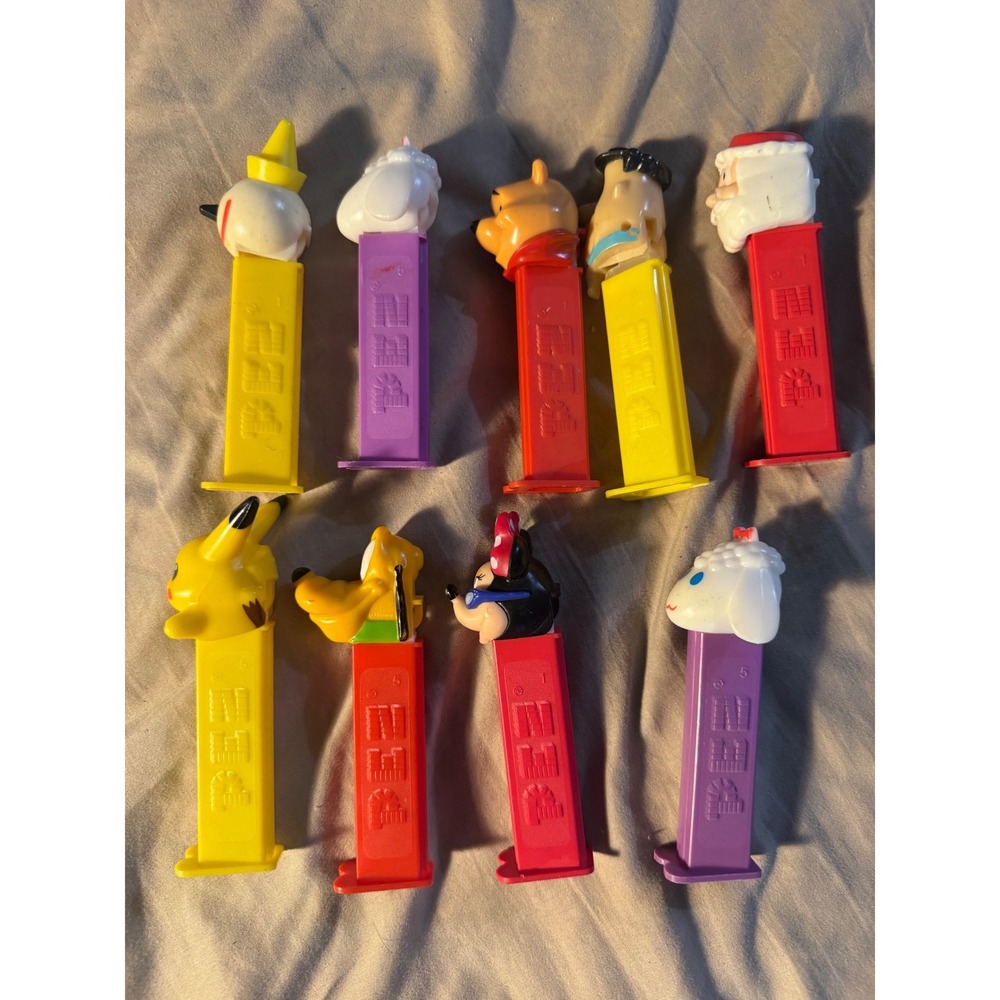 Lot of 10 PEZ Dispensers Disney Pokemon Flintstones Jack Santa Donald Pluto Pooh